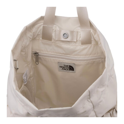 La couleur solide de North Face Bonney, le cordon de crampon simple et polyvalent ouvre et fermer le sac à dos en nylon pour les femmes crème crème