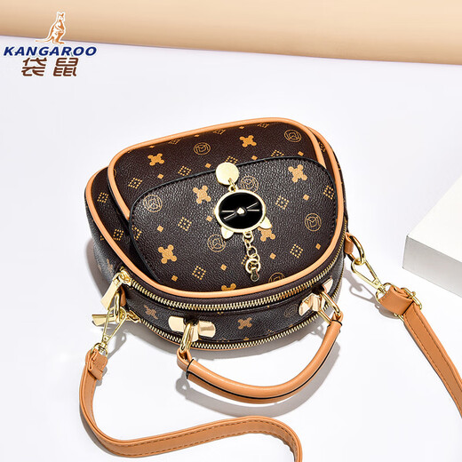 Kangaroo (Kangaroo) Kleine Tasche Neue 2025 Frauenbeutel Trendy Fashion Internet Promi Einschuld Crossbody Bag Handheld Small Runde Tasche bedruckte kontrastierende Farbe Frauenbeutel Kaffee Blume Weiß