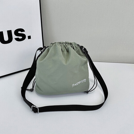 双肩包男抽绳超薄新款时尚潮流可折叠斜跨背包情侣个性纯色小书包 绿色