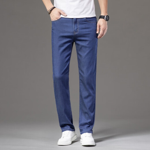 Jeep SpiritJeep Jeep Jeep Summer Jeans masculinos Pantalones delgados para hombres de hombres sueltos para hombres nuevos pantalones elásticos de alta gama FXNZ-9767 Azul de tenis transpirable 31 Circunción de cintura Dos pies cuatro pies cuatro pies