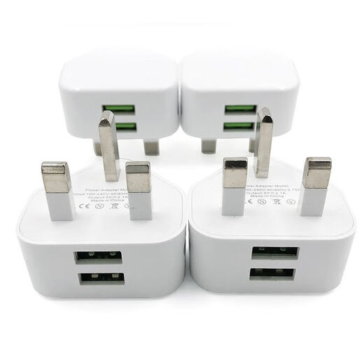 International universal conversion plug Hong Kong version British standard dual usb charging head triangle plug Hong Kong Macau Singapore mobile phone charger 5V2.4A British standard dual UBS British standard Hong Kong and Macau exclusive