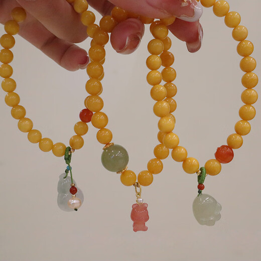 Fat Donglai's same style beeswax bracelet chicken fat yellow beeswax bracelet 5mm round beads women's silver plated ancient gold lotus pod south red beeswax lotus pod bracelet S