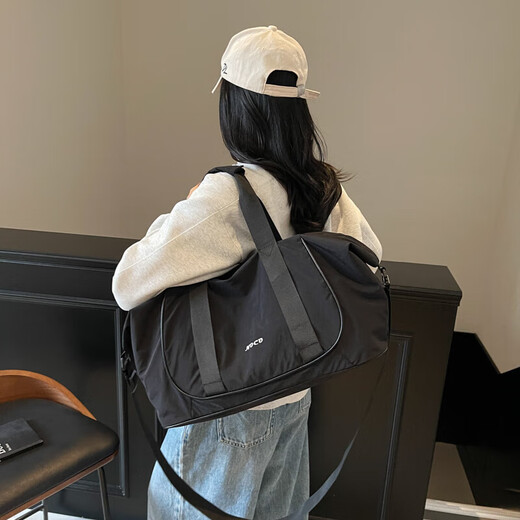 Neue Kurzstrecken-Reisetasche für Frauen mit großer Kapazität Leichtes Duffle Bag Fitness Bag Expansion Vielseitiger Modetrend-Crossbody-Tasche Schwarzer regulärer Stil