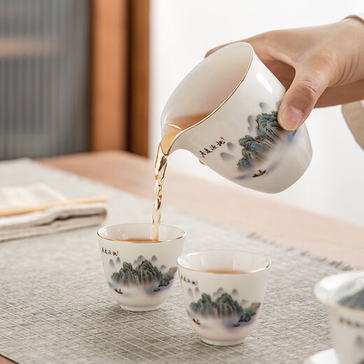 Gold inlaid jade mutton fat jade porcelain tea set Household ceramic tureen teapot teacup Kung Fu tea set complete gift box Taoyuan Yiju teapot tureen set 13 pieces