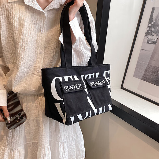 Lienzo de gran capacidad Fashion Bolso informal Bolso 2025 Autumno Nuevo versátil INS ONE-HOLEZA ACARMA BOTA BACK BLANCO