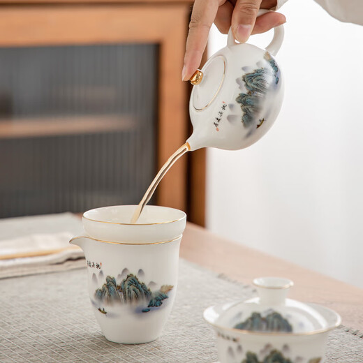 Gold inlaid jade mutton fat jade porcelain tea set Household ceramic tureen teapot teacup Kung Fu tea set complete gift box Taoyuan Yiju teapot tureen set 13 pieces