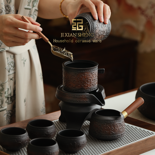 Mr. Ji's Dunhuang Forbidden City Purple Pottery Automatic Teapot, Teacup and Tea Set is a Mid-Autumn Festival birthday gift for the elders. 1. (Twinkle Pattern) Purple Pottery Automatic Set of 9 Pieces in Leather Box