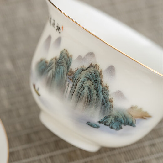 Gold inlaid jade mutton fat jade porcelain tea set Household ceramic tureen teapot teacup Kung Fu tea set complete gift box Taoyuan Yiju teapot tureen set 13 pieces