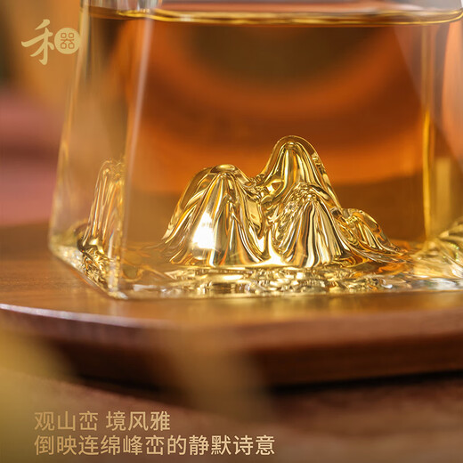 He Qi Sheng Jin Cha Hai Guanshan high borosilicate heat-resistant glass fair cup mountain-shaped cup bottom with green handle 360ml