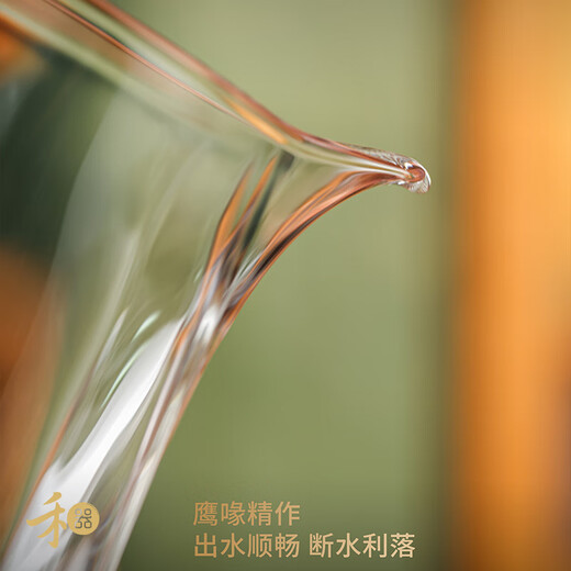 He Qi Sheng Jin Cha Hai Guanshan high borosilicate heat-resistant glass fair cup mountain-shaped cup bottom with green handle 360ml