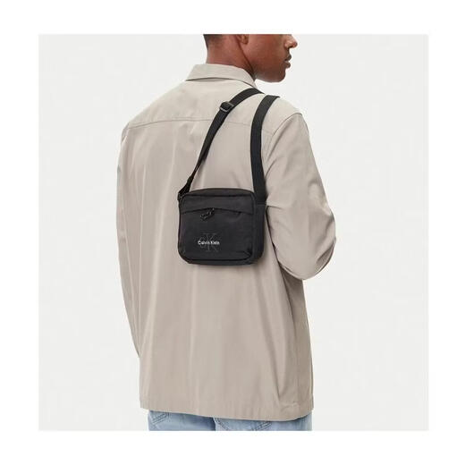 Calvin Klein Jeans men's shoulder bag, lightweight carry, multi-pocket storage, daily commuting, water-repellent surface, black fabric material, Black ONE SIZE