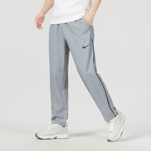 Nike Nike 2024 Automne Nouveau Pantalon décontracté sportif pour hommes Gray Straight Elastic Fitness Running Running Pantal