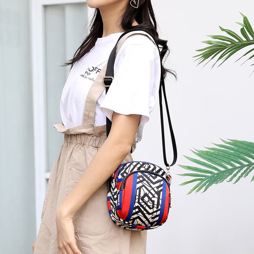 Sac cool kangourou nouveau sac à bandoulière printemps et été pour les femmes coréen version mini téléphone portable portefeuille