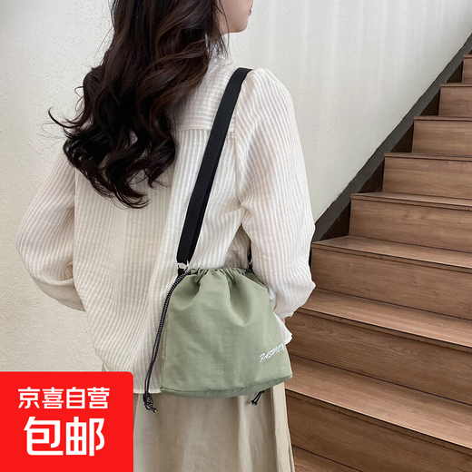 双肩包男抽绳超薄新款时尚潮流可折叠斜跨背包情侣个性纯色小书包 绿色