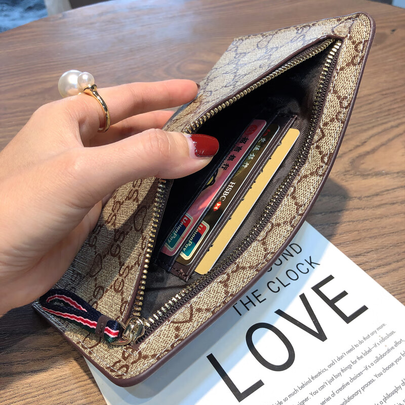 Chanel Xiaoxiang European and American classic print unisex PU wallet women's thin long wallet zipper coin purse women's clutch brown 3 card slots medium size small mobile phone