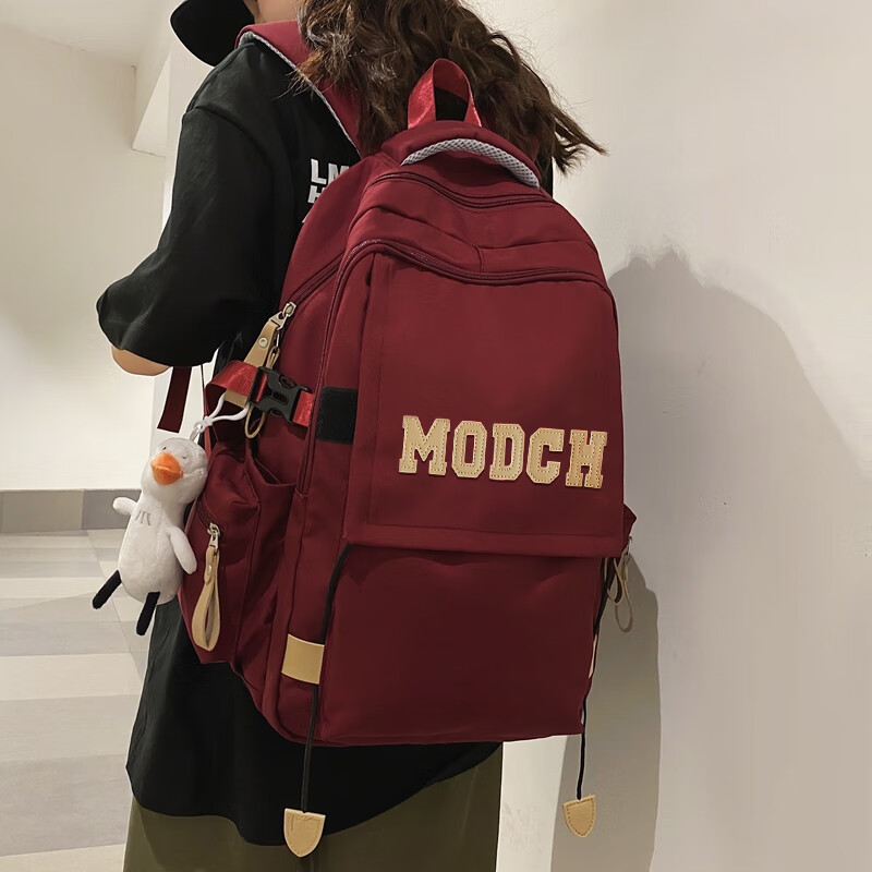 Doublestar schoolbag, junior high school girl, high school student backpack, trendy large capacity sports simple computer bag, red with duck pendant
