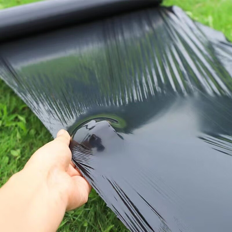Brand new black mulch film weed control film black orchard agricultural mulch vegetable plastic film thickened insulation film 20 pounds black 1.4 silk thick 1 meter wide 400 meters long