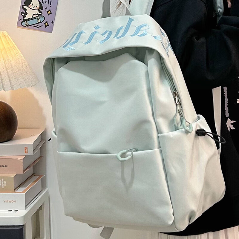 Yookdd (yookdd) backpack simple solid color junior high school college student schoolbag female large capacity computer bag mountaineering bag travel backpack schoolbag fresh blue ribbon pendant