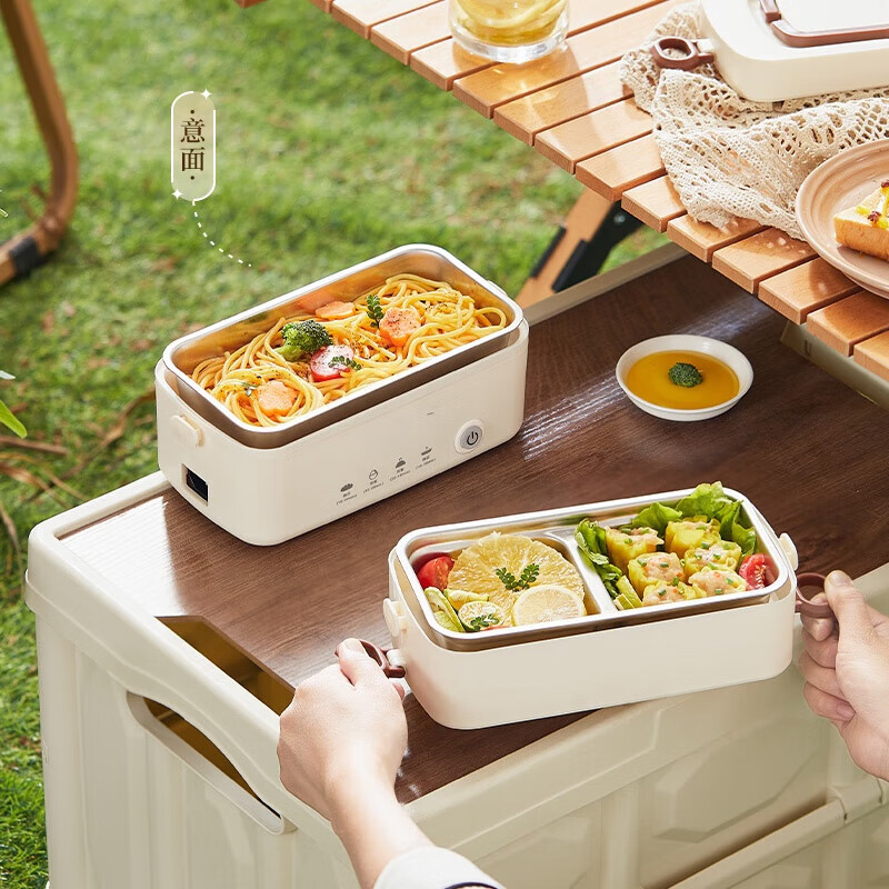 Electric lunch box for heating and keeping warm rice. Mini portable rice cooker for office workers. It can steam and automatically shut off the power. Double layer 1200 ml. 304 stainless steel inner tank. Double layer 1200 ml.