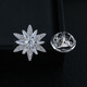 Qianbaolai Xiao Zhan's same style small snowflake brooch men's suit business light lock button decorative shirt collar pin silver gift box