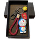 Doraemon Dingdang Cat Figure Car Keychain Cute Cartoon Men and Women Couple School Bag Pendant Gift Laughing Cat + Three Red Ropes + Red An + Gun Eight Gift Box