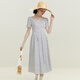 Fan Silan 23FS12172 Französisch Retro Elegantes Temperamentkleid für den Sommer für Frauen mit mittlerer Länge mit schwarzen Tupfen auf weißem Hintergrund s