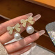 Bai Qixin women's pearl bow earrings without pierced ears niche high-end elegant light luxury earrings new birthday gift bow pearl earrings