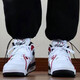 耐克（NIKE）篮球鞋男鞋2025夏季新款运动鞋AIR FLIGHT 89简版AJ4休闲鞋板鞋 FD9928-101白红 40.5