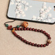 Ding fei chinesischer Stil kleines Blatt rotes Sandelholz Mobiltelefonkette Lanyard für Männer und Frauen kurzes Handgelenk Lanyard Pfirsich Holz Glockenbeutel Anhänger Sandelholz Mobiltelefon Hang A21-308