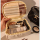 妆 妆 赟 赟 Portable makeup bag Large -capacity hand -to -storage bag waterproof giant capable makeup skin care product storage bag upgrade thicker models [milk white]
