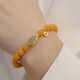 Goldsmith Lee's natural beeswax bracelet is transformed into yellow honey and Hetian jade gourd bracelet, which is an ancient style gift for best friends. Yellow honey and Hetian jade fortune bracelet 8mm