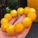 Fat Donglai quality beeswax bracelets chicken oil yellow floating flowers for old boys and girls round beads amber bracelet transfer decoration 16mm diameter floating flower bracelets for men