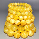 Fat Donglai same style beeswax floating flower bracelet second generation amber chicken fat yellow lemon yellow and white round bead bracelet for men and women single circle 18MM