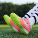 FEELACES children's football shoes broken nails for men and women Falcon Messi student training shoes for children TF artificial grass sneakers 6195 orange broken nails 29 [socks + ball bag + guard plate]
