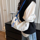 Jingzhi Casual Nylon -Tasche für Frauen im Herbst und Winter Neue modische Umhängetasche vielseitige Breitband -Crossbody -Kissen -Tasche Weiß und Blau