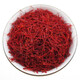 Zhenjiyan’s selected authentic saffron saffron soaked in water. Selected saffron five grams of gold bottle with tweezers