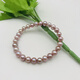 Drops of water form pearls. Nanzhu Family Pink Purple Freshwater Pearl Bracelet Elastic Cord Nine Purple Lihuo Practical and Convenient Bracelet for Mom 6.3-7.3mm Pearls