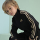 Adidas Chaqueta para niños Spring Cardigan para niños al aire libre Sports Versátiles versátiles de cuello negro/oro 128