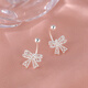 Xiangnan 999 sterling silver bow earrings 2025 new popular light luxury earrings niche high-end feminine earrings 999 silver hollow bow earrings (pair)