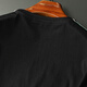 T-shirt à manches courtes à manches courtes à manches courtes de M. Guan
