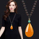 Fat Donglai same style beeswax pendant old color water drop long men and women ethnic style amber necklace chicken oil yellow square brand sweater old material beeswax water drop pendant