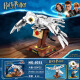 lE high building blocks Hogwarts Castle Hedwig assembled model castle street view children's toys boys Burrow attack [1047 particles]