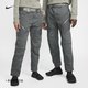 耐克（NIKE）男女长裤运动裤情侣休闲拼接时尚耐穿拉链口袋FJ7372 025尘光子色/暗泥灰 S