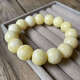 Junbu natural white beeswax bracelet Russian material full of honey white flower wax apple beads bracelet bone china white old type beads small pier and drum beads