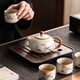 Porcelain brand tea set, one pot and four cups, household light luxury Kung Fu teapot, tea cup with tea tray, small set for making tea for guests, Huang Ru Yu Huang Liang 4 cups + walnut color small square plate