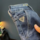 Wolf Kleidung Jeans Herren Frühling und Herbst 2025 Neue Mode gerade losen schlanker und vielseitiger gedruckter Stretch Casual Hosen Blau regulär 9902 33
