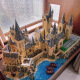 lE high building blocks Hogwarts Castle Hedwig assembled model castle street view children's toys boys Burrow attack [1047 particles]
