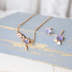 Qian Junqingyu Daisy. Japanese niche sweet tanzanite zircon necklace asymmetrical earrings fairy daily silver jewelry a pair of earrings