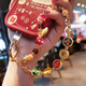 Zhenge God of Wealth de richesse Yuanbao Pendant la chaîne mobile Mobile Ins Fortune Bracelet Bracelet Short Niche Pendentif Hobe de poignet de perle