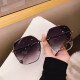 2025 new frameless edge-cut round sunglasses fashionable sunglasses women's big face slimming glasses anti-UV rays gold frame gradient gray
